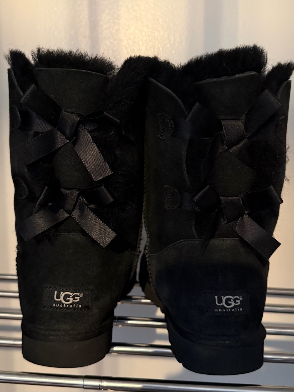 UGG Black Short Shearling Boots with Back Bow Detail